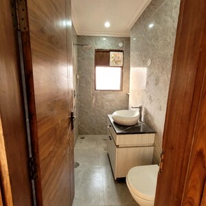 Bathroom in 3.5 BHK Builder Floor at Green Fields Colony – for Sale