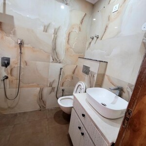 Bathroom in 3.5 BHK Builder Floor at Green Fields Colony – for Sale