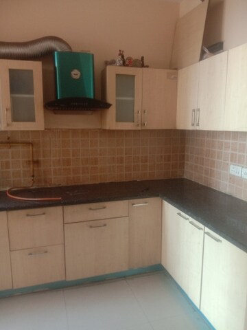 Kitchen in 3 BHK Apartment at Mahagun Mywoods, Sector 16c Greater Noida – for Rent