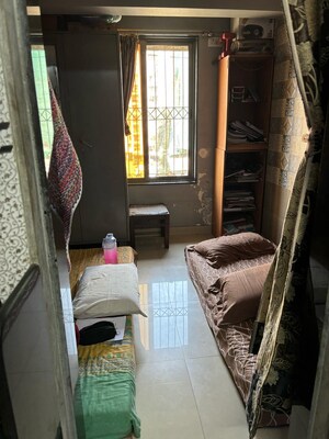 Living Room in 1.5 BHK Apartment at Latif Park, Mira Road – for Sale