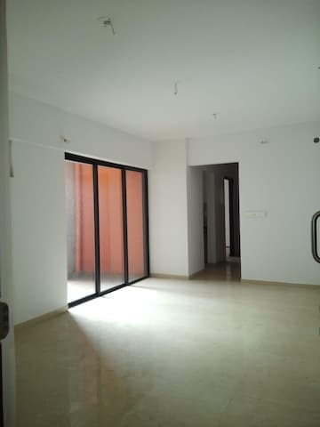 Living Room in 2 BHK Apartment at Lodha Palava Downtown, Dombivli East – for Rent