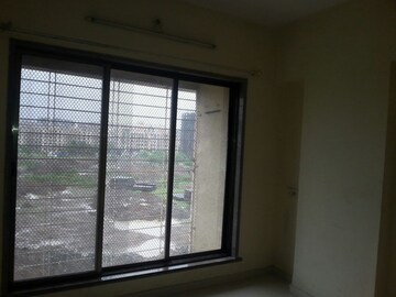 Room in 1 BHK Apartment at Man Opus, Mira Road – for Rent