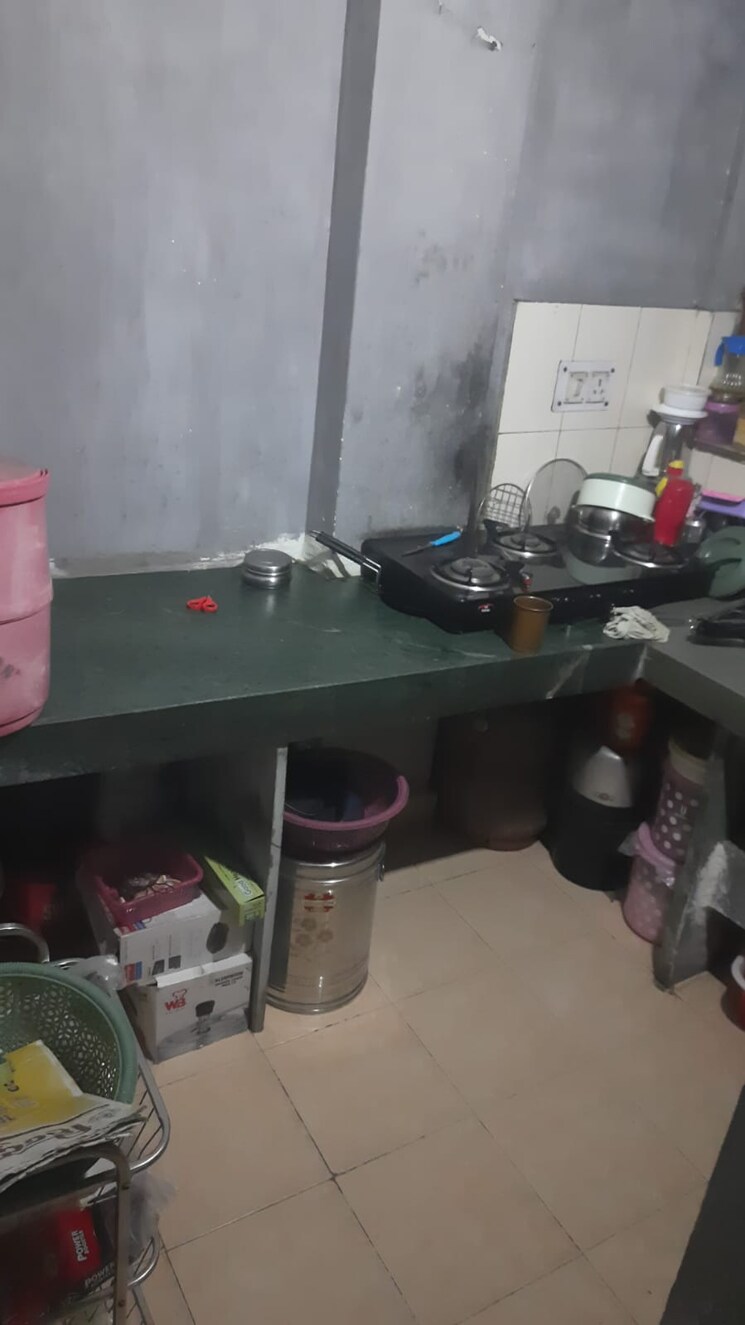 Kitchen, manokamna-apartments-rohini 1 Bedroom 363 Sq.Ft. Apartment In Rohini Sector 34 Delhi 8593171