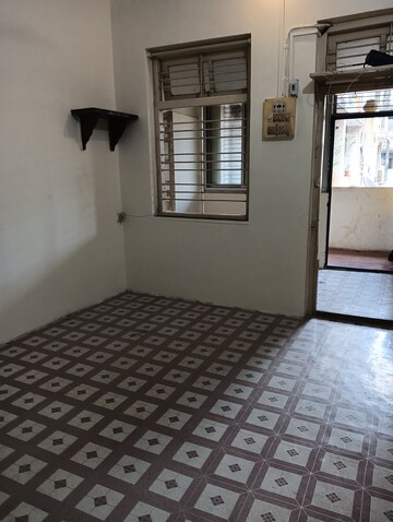 Bedroom in 1 RK Apartment at Ramanand CHS, Vile Parle East – for Rent