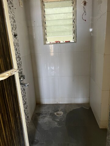 Bathroom in 1 BHK Apartment at Bhamini Sankul, Naigaon East – for Rent