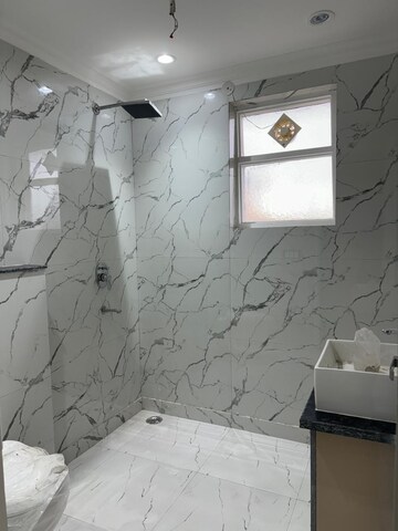 Bathroom in 4 BHK Builder Floor at Green Fields Colony – for Rent