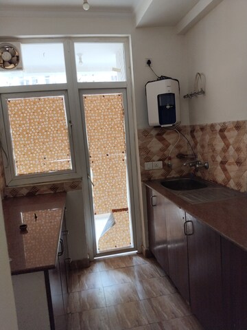 Kitchen in 2 BHK Apartment at Amrapali Leisure Park, Amrapali Leisure Valley – for Rent