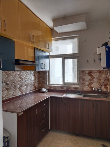 Kitchen in 3 BHK Apartment at Amrapali Leisure Park, Amrapali Leisure Valley – for Rent