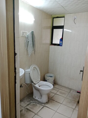 Bathroom in 1 BHK Apartment at Devika Skypers, Raj Nagar Extension – for Sale