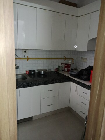 Kitchen in 1 BHK Apartment at Devika Skypers, Raj Nagar Extension – for Sale