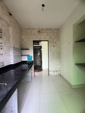 Kitchen in 1 BHK Apartment at Parsik Nagar – for Sale