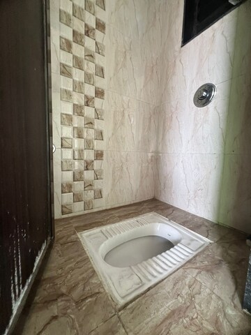 Bathroom in 1 BHK Apartment at Parsik Nagar – for Sale