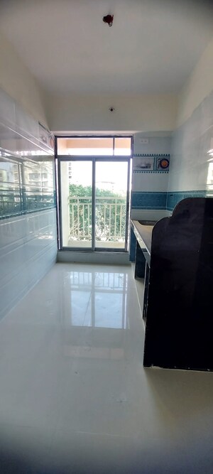 Kitchen in 2 BHK Apartment at Parsik Nagar – for Sale