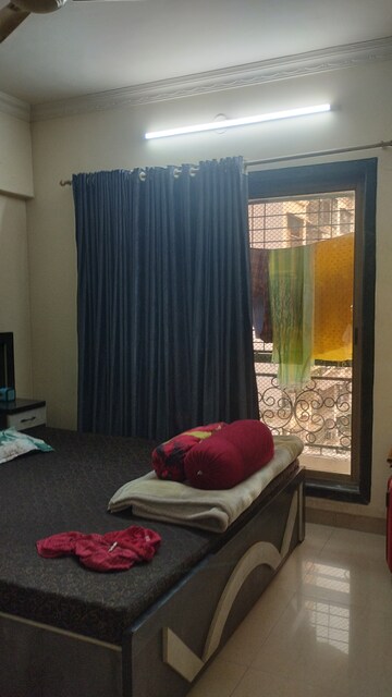 Living Room in 2 BHK Apartment at Regency Estate, Dombivli East – for Rent