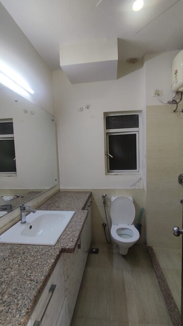 Bathroom in 3 BHK Apartment at Moti Nagar – for Rent