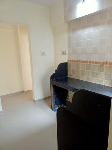 Kitchen in 1 BHK Apartment at Parsik Nagar – for Sale