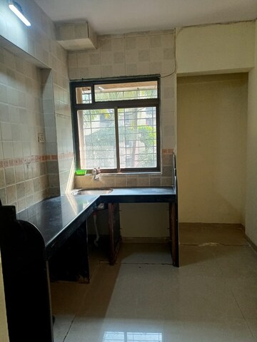 Kitchen in 1 BHK Apartment at Parsik Nagar – for Sale