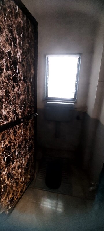 Living Room in 1 BHK Apartment at Parsik Nagar – for Sale