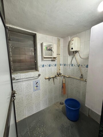 Bathroom in 1 BHK Apartment at Poonam Darshan CHSL, Dahisar East – for Rent
