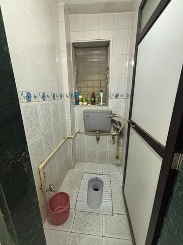 Bathroom in 1 BHK Apartment at Poonam Darshan CHSL, Dahisar East – for Rent