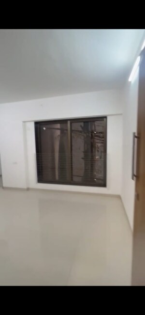 Room in 1 BHK Apartment at Neelyog Towers, Malad East – for Sale