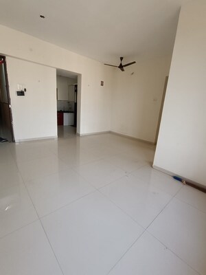 Room in 2 BHK Apartment at Bhoomi Acres, Waghbil – for Sale