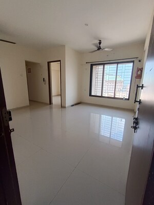 Room in 2 BHK Apartment at Bhoomi Acres, Waghbil – for Sale