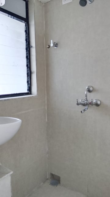 Bathroom in 1 BHK Apartment at Runwal Primrose, Dombivli East – for Rent