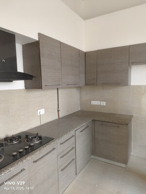 Kitchen in 4 BHK Apartment at Paras Quartier, Gwal Pahari – for Sale