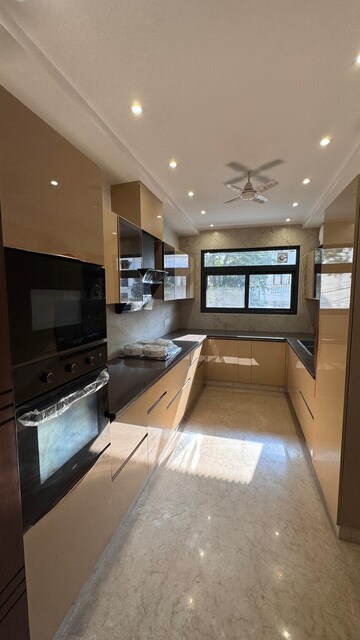 Kitchen in 4 BHK Builder Floor at Ansal Sushant Lok I, Sector 43 – for Rent