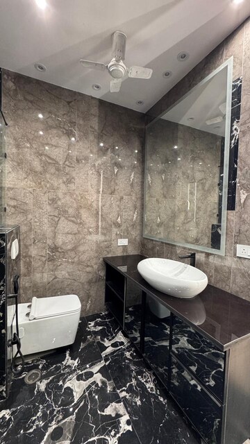 Bathroom in 4 BHK Builder Floor at Ansal Sushant Lok I, Sector 43 – for Rent