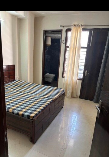 Bedroom in 2 BHK Builder Floor at RWA Residential Society, Sector 40 – for Rent