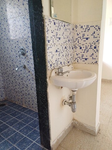 Bathroom in 1 BHK Apartment at Megh Malhar Co-op Housing Society, Ghansoli – for Rent