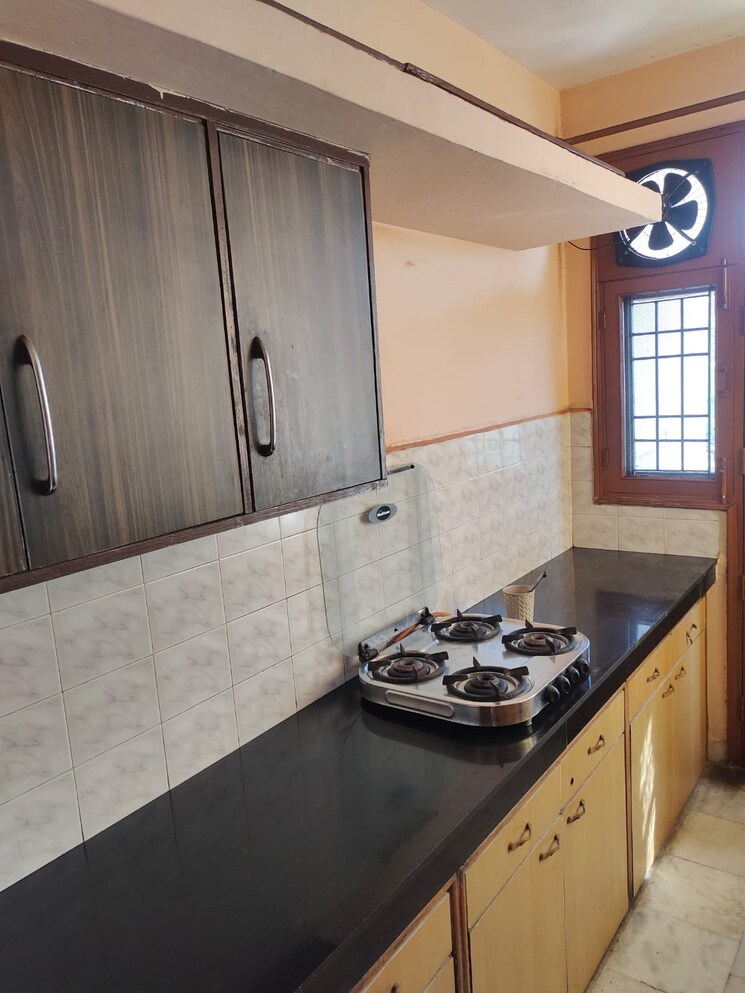 Kitchen, unicity-business-park 2 Bedroom 1255 Sq.Ft. Apartment In Dhakoli Zirakpur 8594051