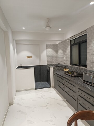 Kitchen in 2 BHK Apartment at Ishwar Parmar River Residency, Chikhali – for Rent