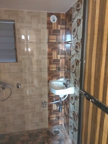 Bathroom in 2 BHK Apartment at Aristone Vasudev Paradise, Mira Road – for Sale