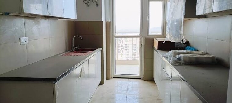 Kitchen, emaar-palm-gardens 3.5 Bedroom 1930 Sq.Ft. Apartment In Sector 83 Gurgaon 8594279