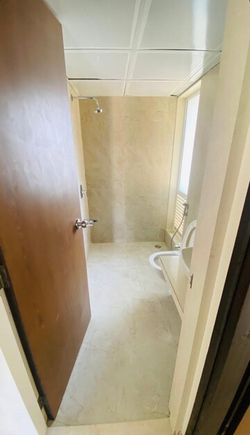 Bathroom in 1.5 BHK Apartment at Dosti West County Phase 4 Dosti Pine, Balkum Pada – for Rent