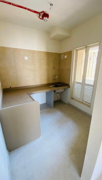 Kitchen in 1.5 BHK Apartment at Dosti West County Phase 4 Dosti Pine, Balkum Pada – for Rent