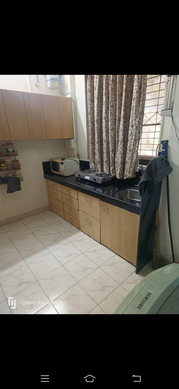 Kitchen in 1 RK Apartment at Ashirwad CHS Naupada, Naupada – for Rent