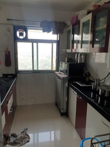 Kitchen in 2 BHK Apartment at RSN Vaibhav Heights, Santacruz East – for Rent
