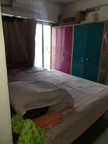 Bedroom in 2 BHK Apartment at RSN Vaibhav Heights, Santacruz East – for Rent