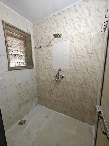 Bathroom in 1 BHK Apartment at Kendriya Vihar Seawoods, Seawoods West – for Rent
