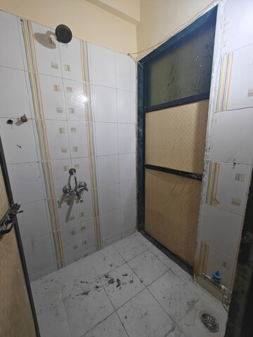 Bathroom in 1 BHK Apartment at Kendriya Vihar Seawoods, Seawoods West – for Rent