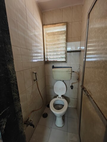 Bathroom in 1 BHK Apartment at Kendriya Vihar Seawoods, Seawoods West – for Rent