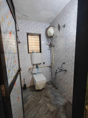Bathroom in 1 BHK Apartment at Shreeji seva chs, Seawoods Sector 42 – for Sale
