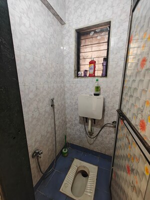 Bathroom in 1 BHK Apartment at Shreeji seva chs, Seawoods Sector 42 – for Sale