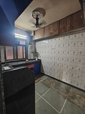 Kitchen in 1 BHK Apartment at Shreeji seva chs, Seawoods Sector 42 – for Sale