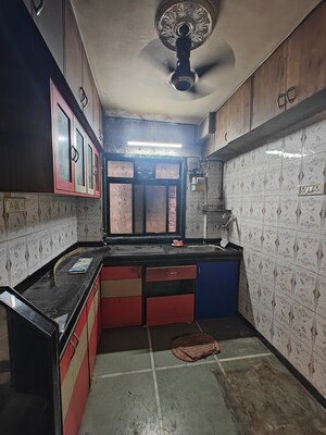 Kitchen in 1 BHK Apartment at Shreeji seva chs, Seawoods Sector 42 – for Sale