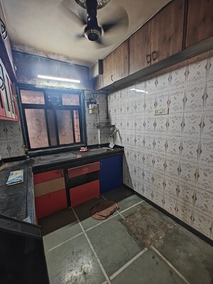 Kitchen in 1 BHK Apartment at Shreeji seva chs, Seawoods Sector 42 – for Sale